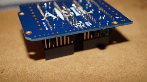 The pcb resting on top of the stacking headers.