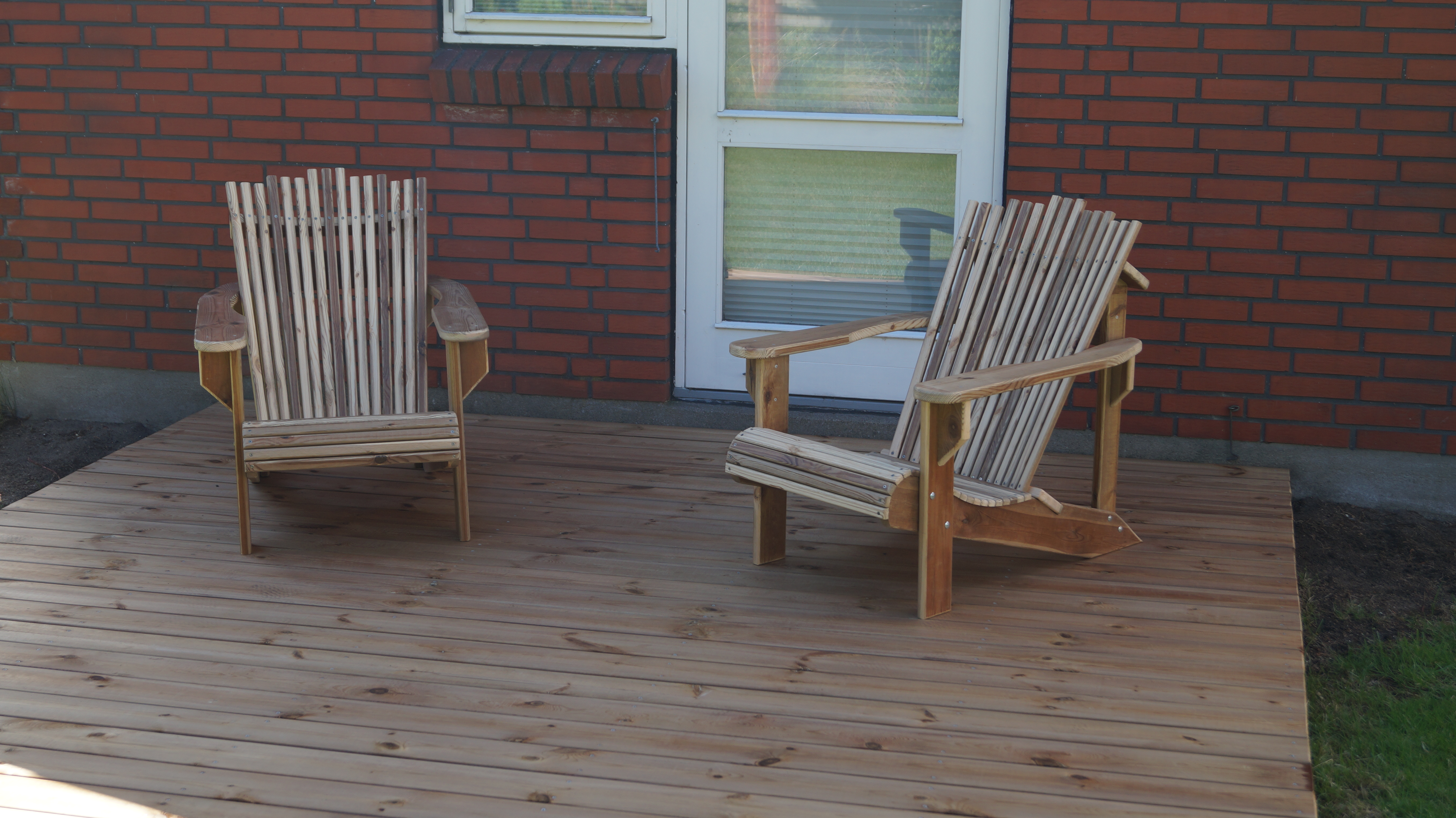 Two muskoka chairs.